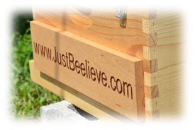 Wooden bee box with engraved letters www.JustBeelieve.com.