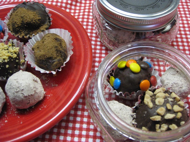 chocolate truffles on a red plate and in small mason jars